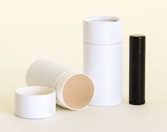 May include: Three white cardboard tubes with a brown cardboard interior. The tubes are different sizes. A black tube is also shown.