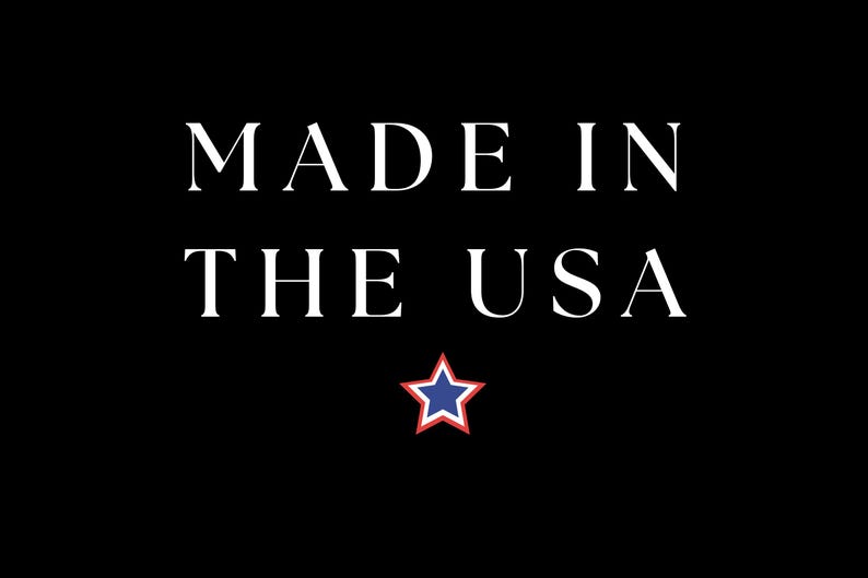May include: White text on a black background reads "Made in the USA" with a red and blue star below.