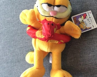 Garfield Plush vintage w/ unattached tag EUC 1980’s? Summer/ Pool Theme