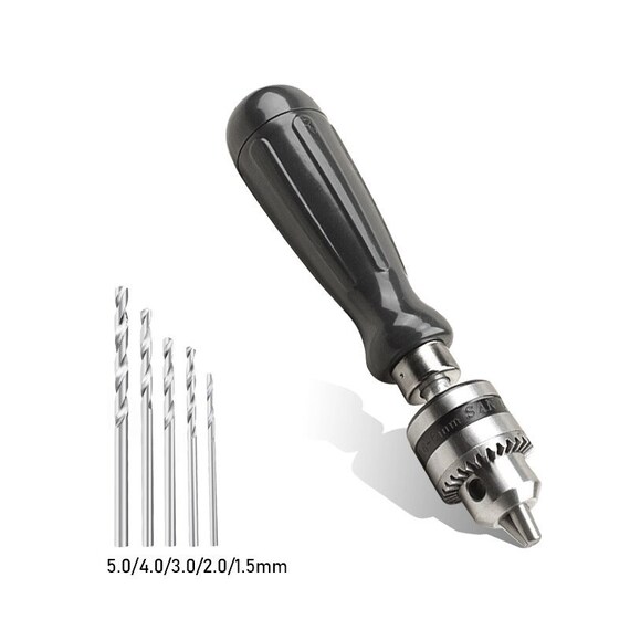 Hand drill with bits outlet