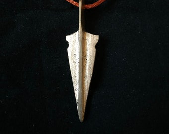 Cast bronze arrow pendant on silk cord
