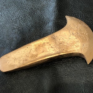 Early Bronze Age flat axe. Life size.