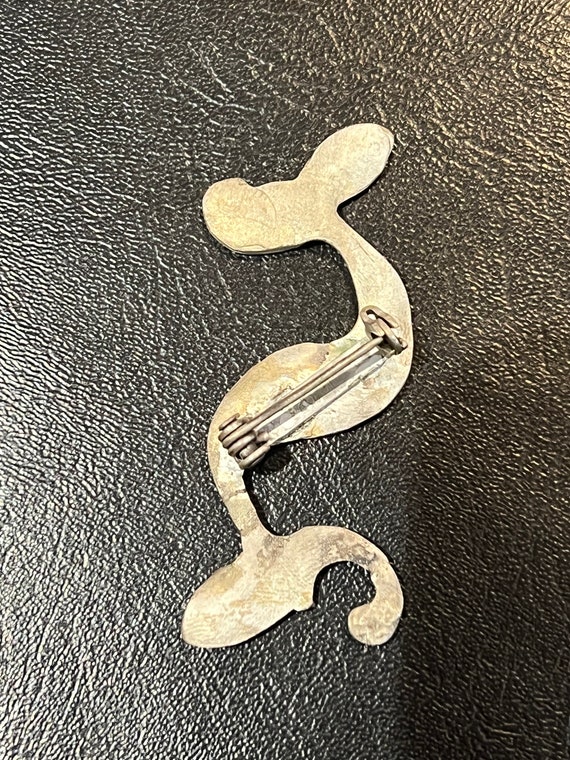 Silver brooch Iron Age Dragonesque style