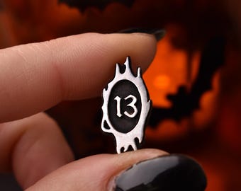 lucky 13 necklace with spiky frame