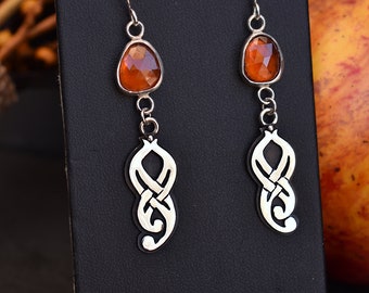 Boucles d'oreilles noeud avec grenat hessonite