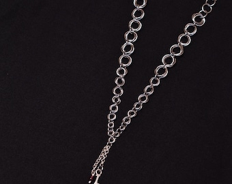 chainmail mobius with sterling silver bat and garnet