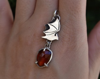 bat necklace with garnet