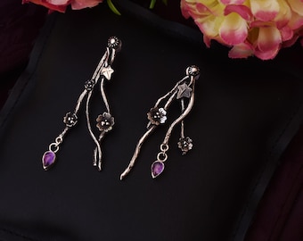 mismached branch earrings with amethysts and cherry blossoms