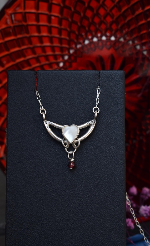 warrior necklace with pearl and garnet