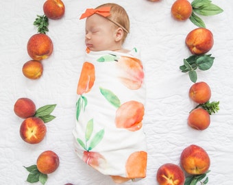 Organic cotton swaddle blanket in Sweet Peach, Watercolor Peaches