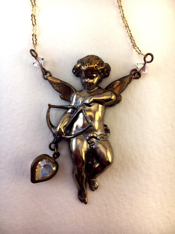 Cupid Necklace with a Mysterious Past