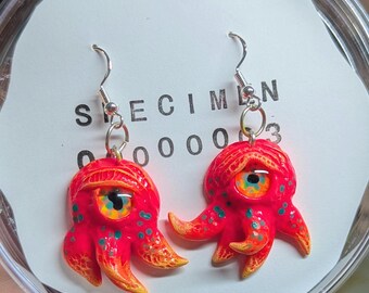 Kolczyki z motywem stworzeń