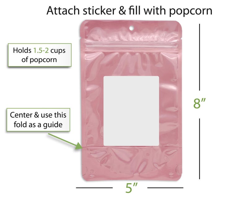 a pink plastic bag with a clear plastic window, and there are instructions on how to attach a sticker and fill it with popcorn.