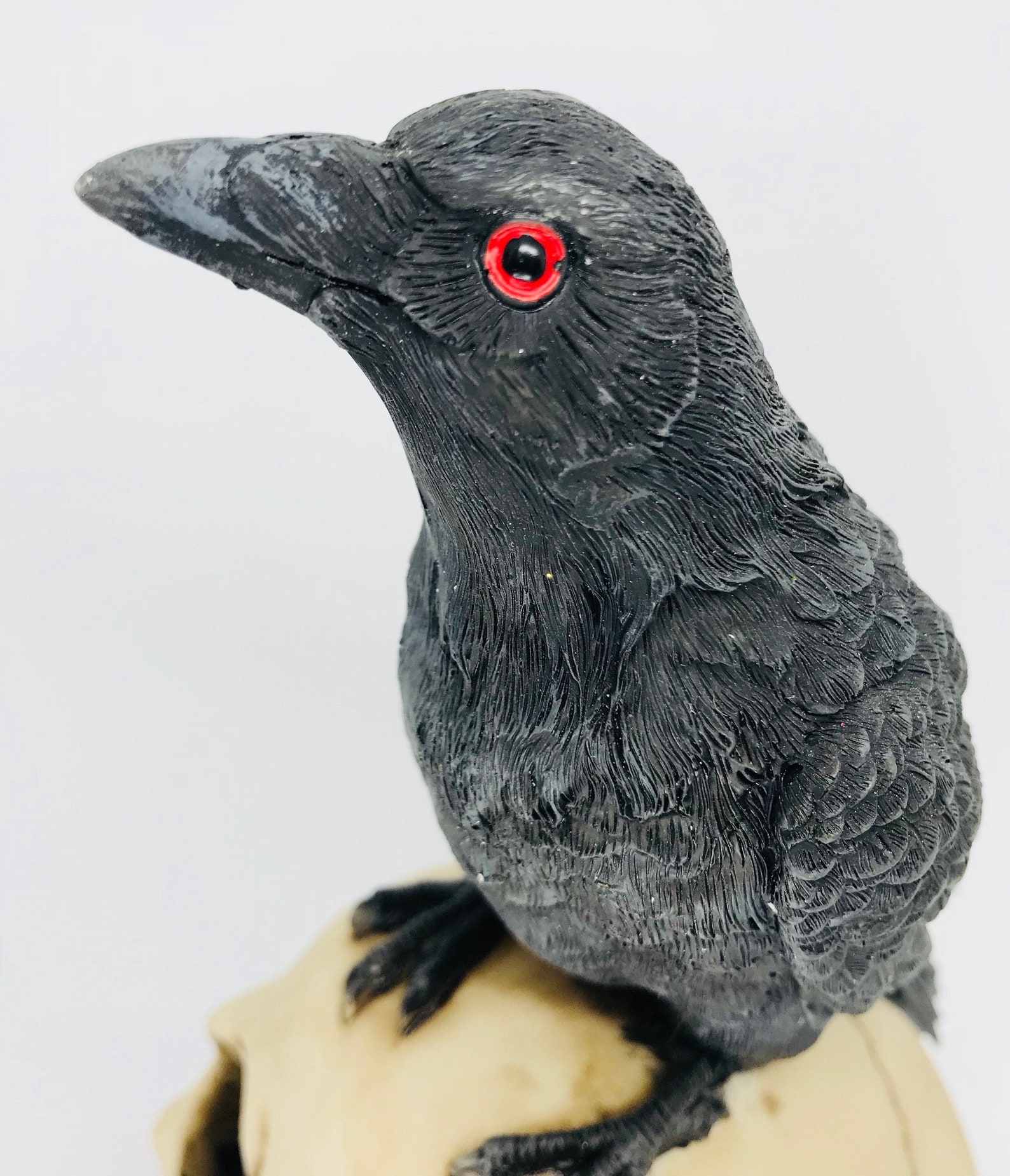 resin raven statue