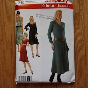 May include: A Simplicity 4948 sewing pattern envelope for 2 hour dresses in sizes HH 6, 8, 10, 12. The white paper envelope features illustrations of four different dress styles in green, black, red, and dark green, with a barcode at the bottom.