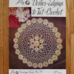 May include: A vintage crochet pattern book cover featuring a white crochet doily with a delicate floral design. The cover is brown with the text "Lily Doilies Edgings to Tat-Crochet" and "Lily Design Book No. 70 10¢ IN U.S.A. 15¢ IN CANADA".