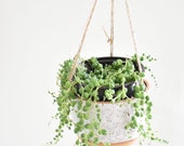 Natural Stoneware and white hanging planter with jute strings and copper