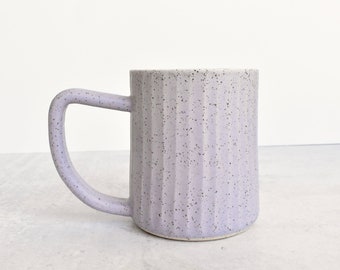 Fluted Ceramic Mug in speckled clay in light purple lavender