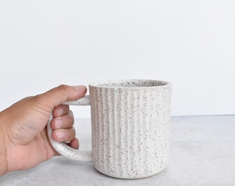 Fluted Ceramic Mug in speckled clay in white