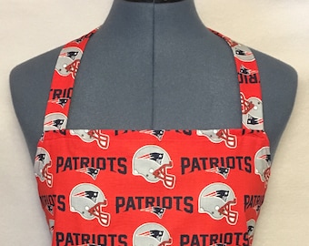 Delantal de barbacoa de tamaño completo con bolsillos de los New England Patriots.