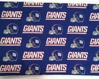 May include: Blue fabric with a repeating pattern of white "Giants" text and a white football helmet with a blue "NY" logo.