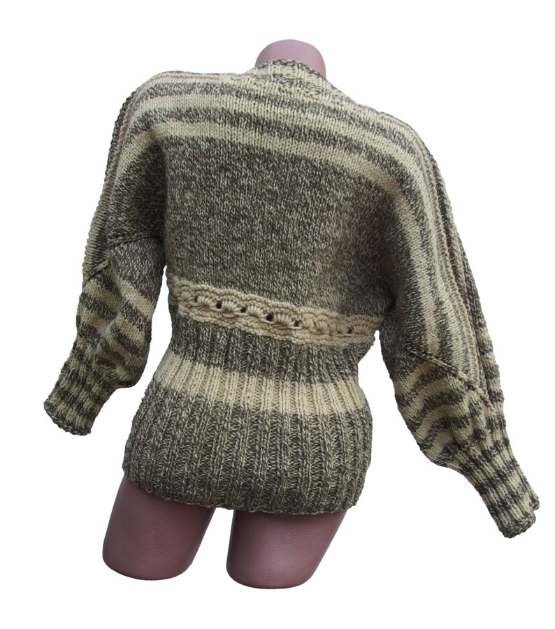 type of sweater made from thick undyed wool