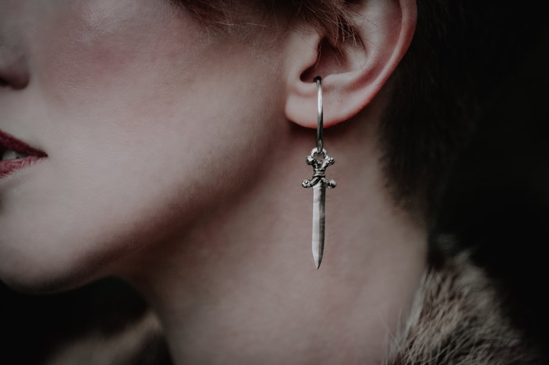 Photo shows the Ear cuffs accented with a sword charm. Charms are sold separately