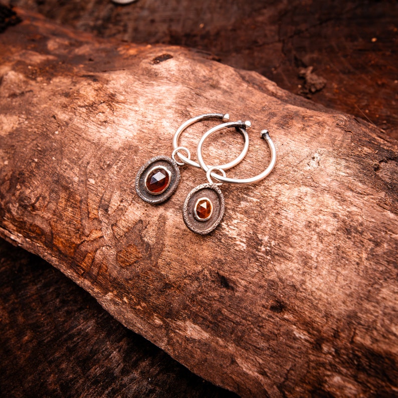 Photo shows the ear cuffs accented with gemstone charms, charms are sold separately.