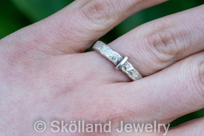 Outlander inspired ring being worn on the 4th finger of the left hand