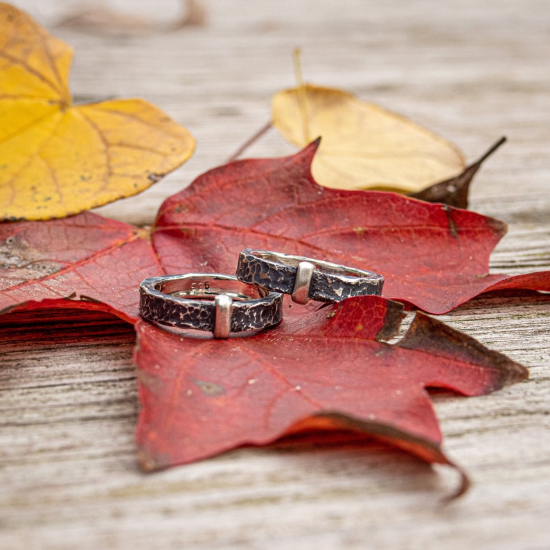 2 unisex rustic wedding bands. Outlander-inspired rings with darkened finishes.