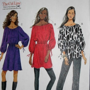 May include: A sewing pattern for a women's top with three different style options. The pattern is from Butterick and has the number B5527 on it. The pattern is for sizes Large, Extra Large, and Extra Extra Large.