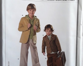 May include: A sewing pattern for a blazer, pants, and a sports jacket. The pattern is for sizes 98 to 140. The pattern is from Burda and the pattern number is 9671.