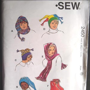 May include: A Kwik Sew pattern for hats and slipper socks, pattern 2450. The pattern includes illustrations of various hat styles, including a jester hat, a hooded scarf, and a pair of red boots. Sizes available are XS-S-M-L-XL.