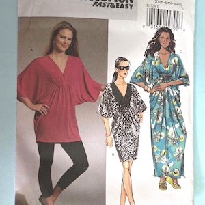 May include: A Butterick sewing pattern, B5329, featuring three women modeling different garment designs. The pattern includes a tunic, a leopard print dress, and a floral print dress. The pattern is labeled "Fast & Easy".