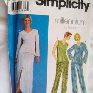May include: Simplicity sewing pattern number 8626 for sizes 10, 12, and 14. The pattern includes instructions for making a long skirt with a slit and a pair of pants. The pattern is part of the Millennium by Simplicity collection.