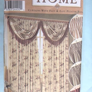 May include: A package for home curtains with fast and easy pleater tapes. The curtains have a floral pattern with a valance and fringe. The word "HOME" is at the top of the package.