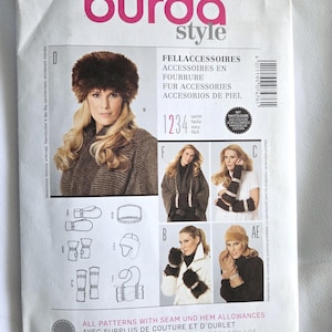 May include: A Burda Style sewing pattern for fur accessories. The pattern features images of hats, gloves, and other accessories. The cover includes the text "FELLACCESSOIRES, ACCESSOIRES EN FOURRURE, FUR ACCESSORIES, ACCESORIOS DE PIEL."