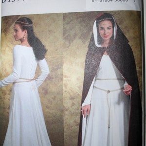 May include: A sewing pattern for a medieval-style gown and cape. The pattern is for sizes 14-16-18-20. The pattern is from Butterick and the pattern number is B4377.