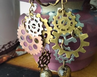 Steampunk gears Earrings with brass color beads dangle on brass lever-back ear wires #40