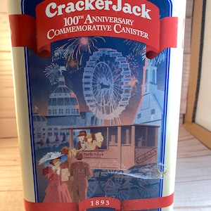 90s  100th anniversary cracker Jack Tin Commemorative canister empty, collectable tins