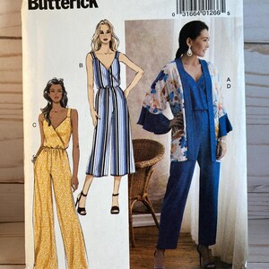May include: A sewing pattern for a jumpsuit with three different styles. The pattern is for sizes 14-16-18-20-22. The pattern is from Butterick and the pattern number is B6691/E5.