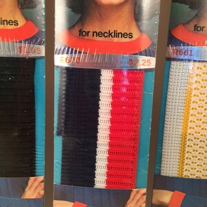 May include: Three packages of knit trim for necklines and sleeves. The trim is in different colors and patterns, including black, white, red, and yellow. The packages are labeled with the price and the trim number.
