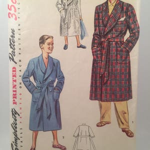 May include: Simplicity Printed Pattern 4133, size 8, for a robe with a plaid pattern. The pattern includes three figures wearing robes, one in a white robe, one in a blue robe, and one in a red and black plaid robe. The pattern is 35 cents.