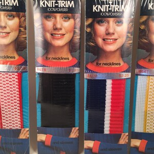 May include: Four packages of knit trim for necklines and sleeves. The trim is available in four colors: red and white, black, navy blue and white, and white and yellow. The packages feature a model wearing the trim and the text "KNIT-TRIM 100% POLYESTER" and the price.