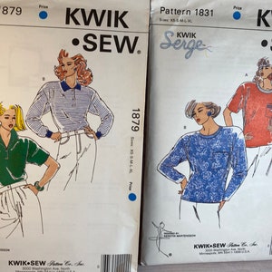 May include: Two sewing patterns from Kwik Sew, one for a striped shirt and one for a blue floral shirt. The patterns are numbered 1879 and 1831.