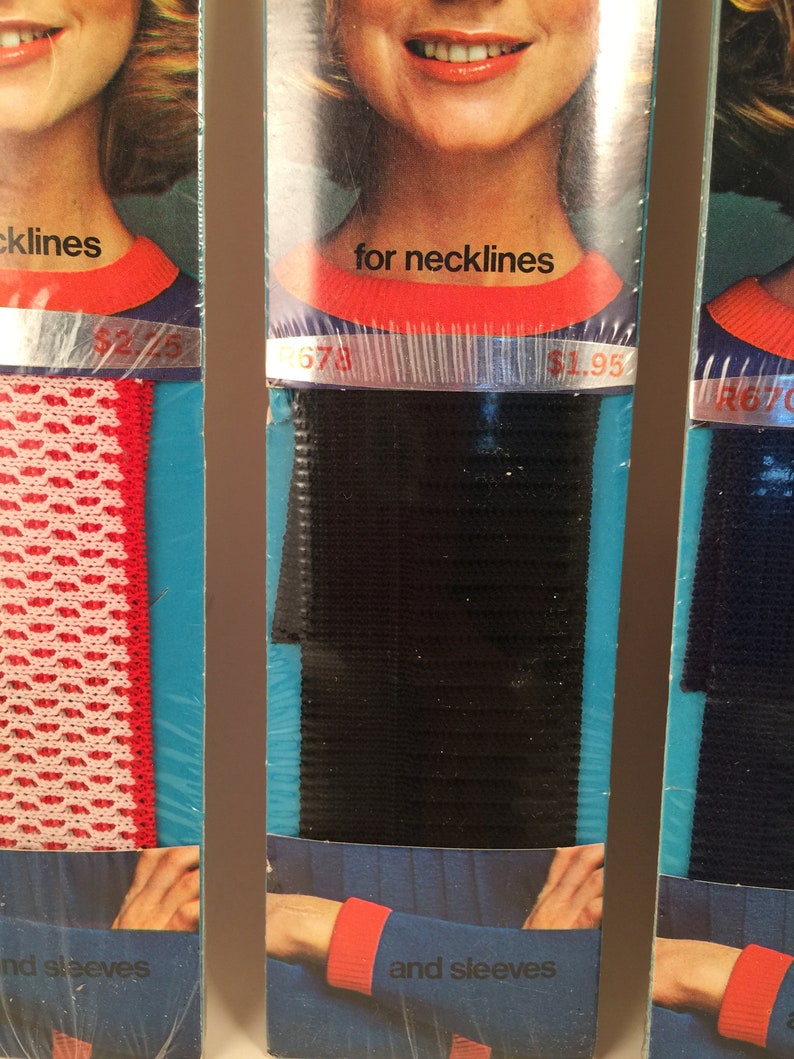 May include: Three packages of black elastic trim for necklines and sleeves. The packages feature a model wearing a red and white knit top with the trim. The price is listed as $1.95.