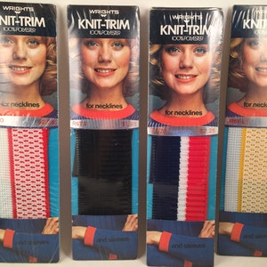 May include: Four packages of knit trim for necklines and sleeves. The trim is in various colors and patterns, including red, white, blue, and yellow. The packages are labeled "Wrights Knit-Trim 100% Polyester" and include the product number and price.