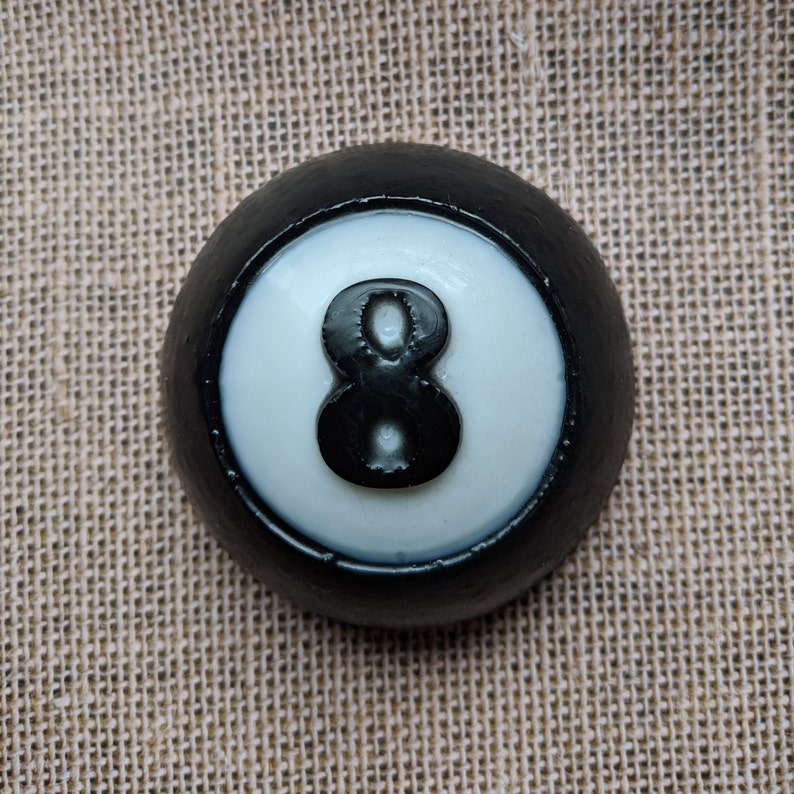 This glycerin and activated charcoal soap is perfect for the billiards player in your life. It is the eight ball, or at least most of it because the back is flat so that the soap will not roll away in the shower. Pick your favorite fragrance.