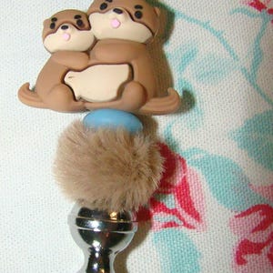 brown otters letter opener