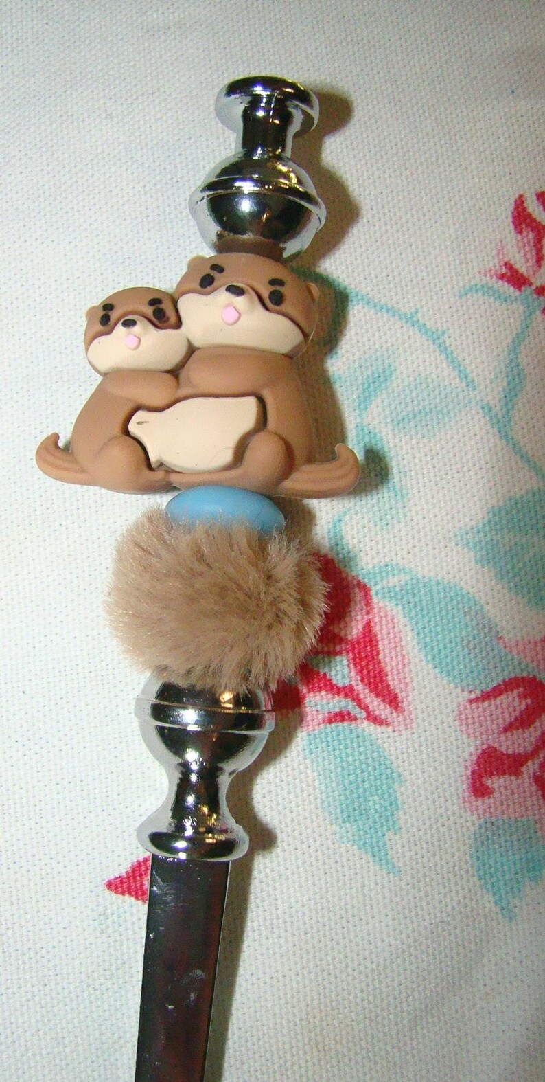 brown otters letter opener